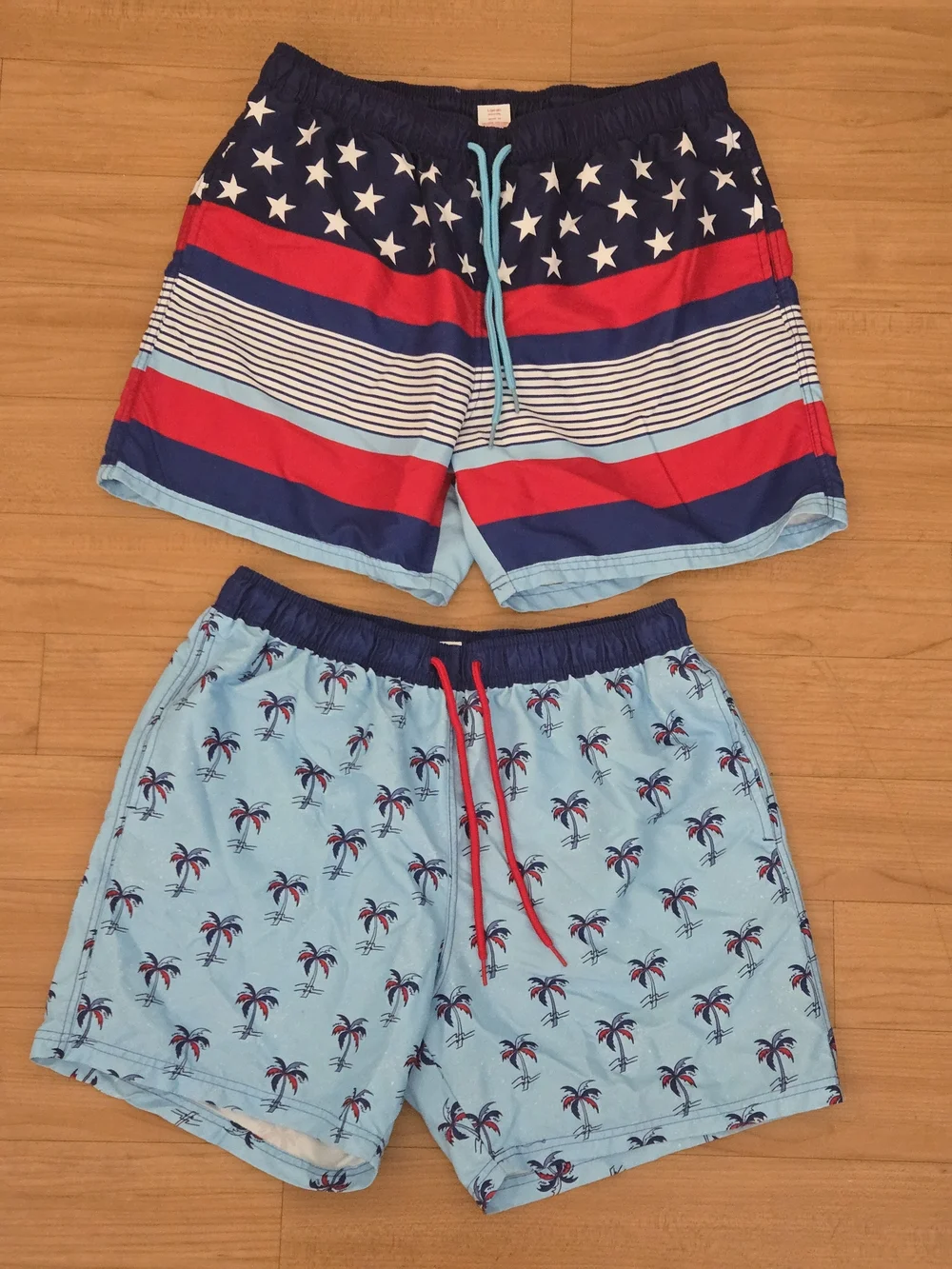 2 Pairs Boys Large Light Blue Palm Print Swim Shorts with Navy & Red Accents